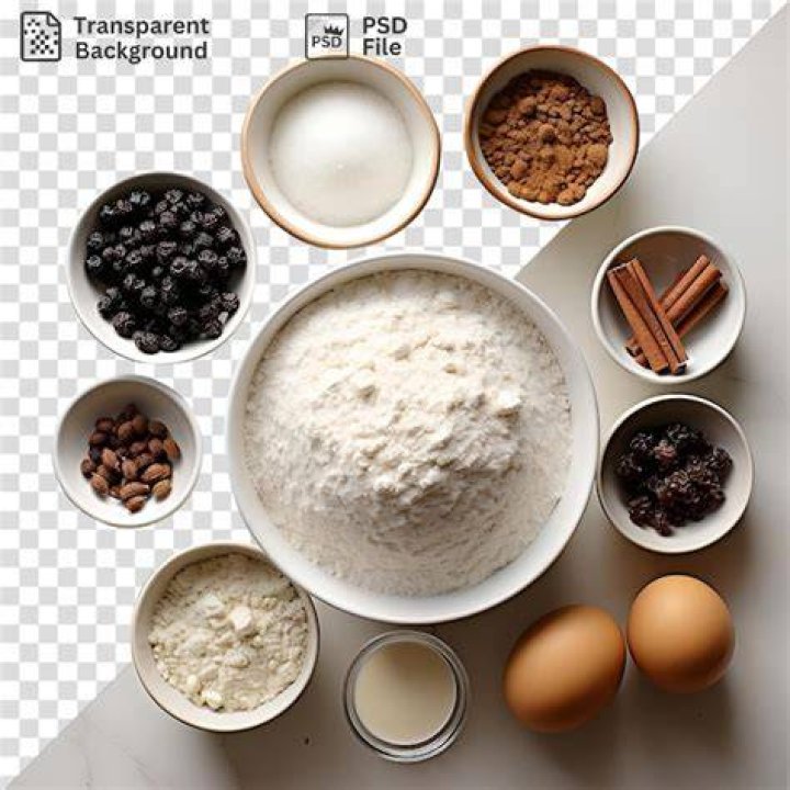 Ingredients in a white bowl for zucchini brownies.